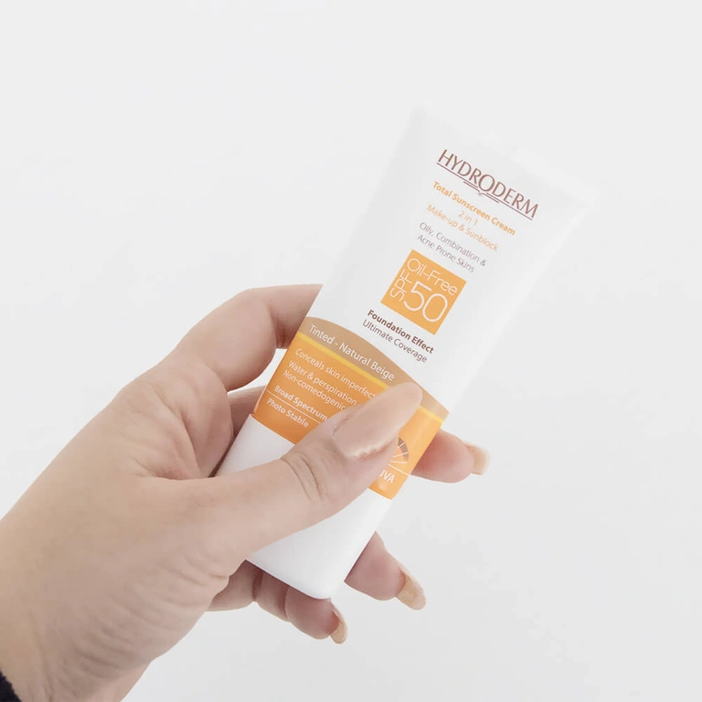 کرم ضد آفتاب کرم پودری هیدرودرم SPF50 پوست چرب و مختلط 40 میل - بژ طبیعی